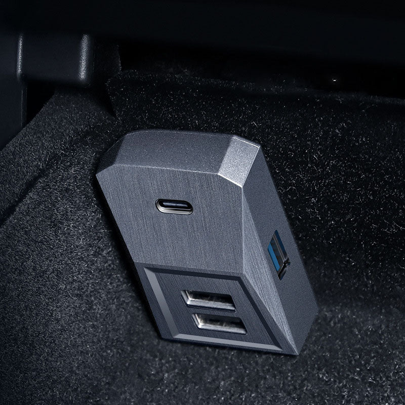Four-port Tesla glove box USB hub installed inside a vehicle glove box