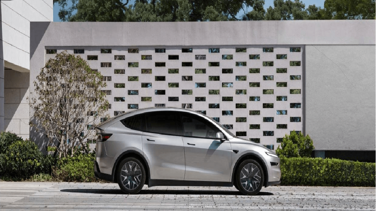 Silver Tesla Model Y L in the company