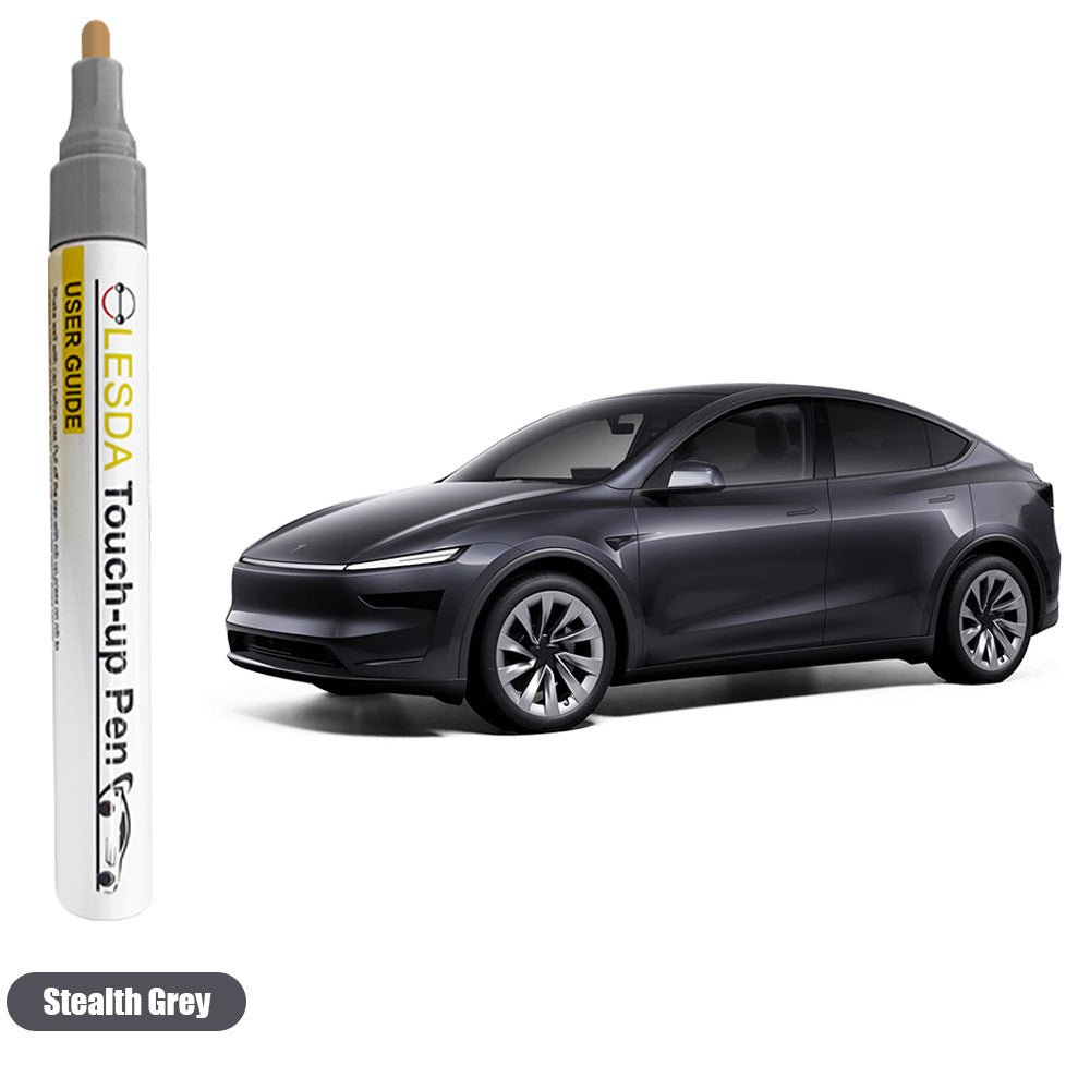 Lesda touch-up pen next to a black car on a white background