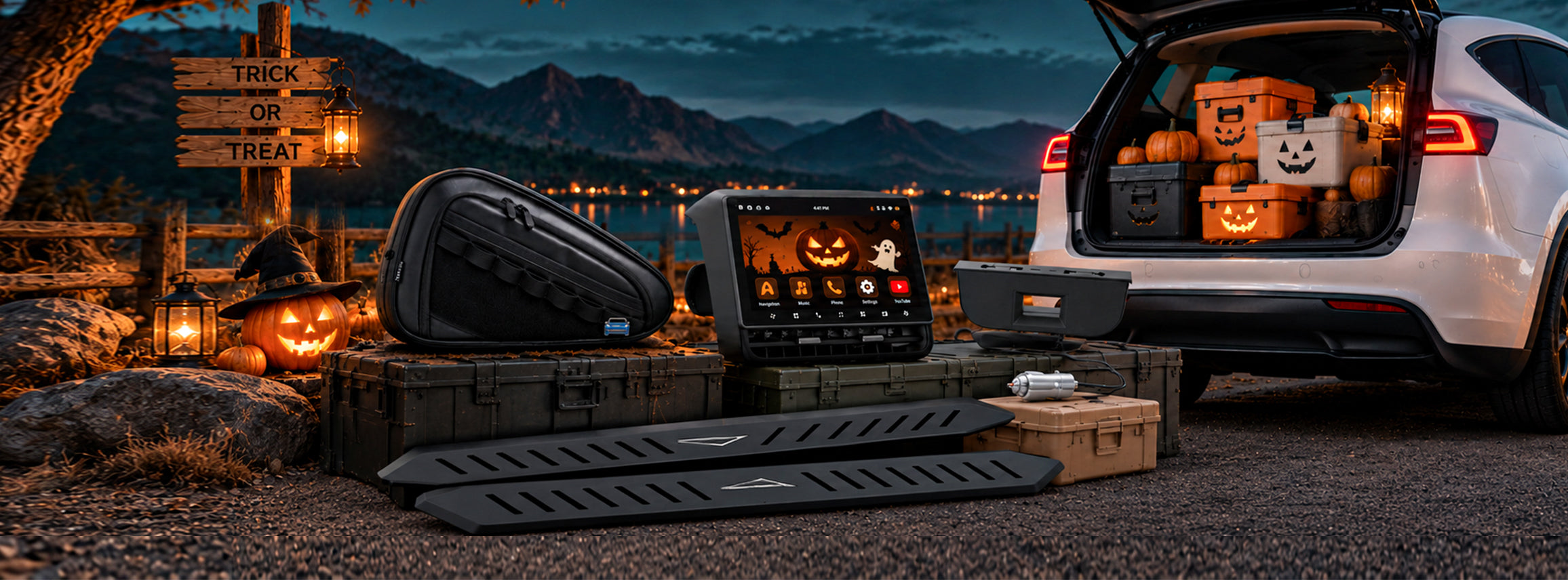 Tesla accessories beside a lakeside Halloween campsite