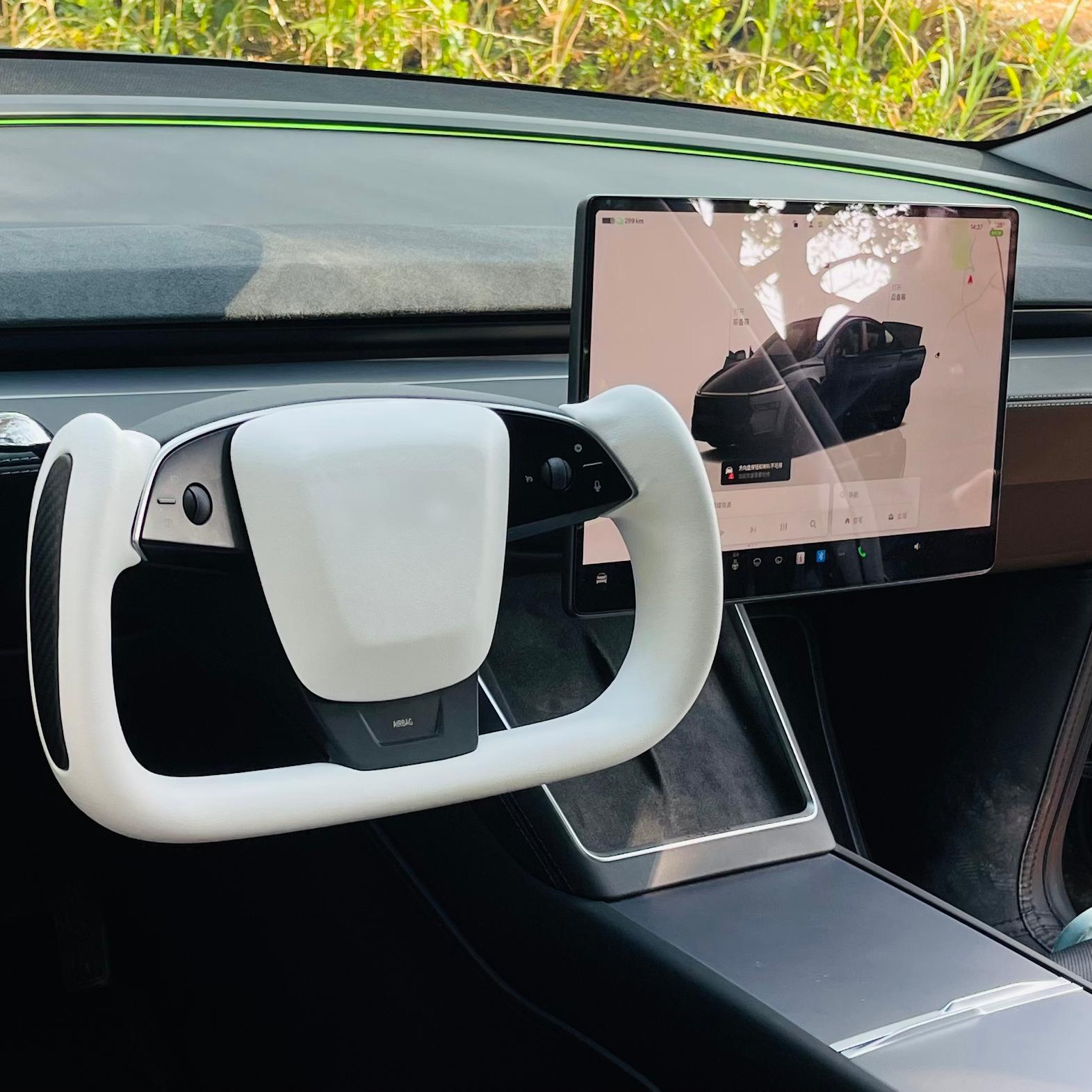 Tesla Yoke Steering Wheel — direct bolt-on fitment shown