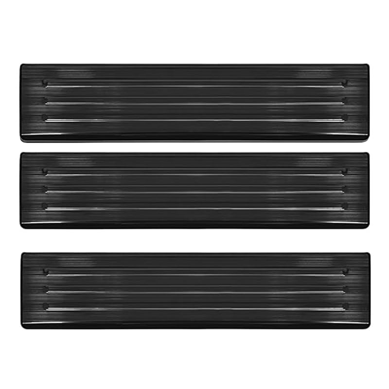 Black textured Cybertruck tailgate protector with raised anti-slip surface