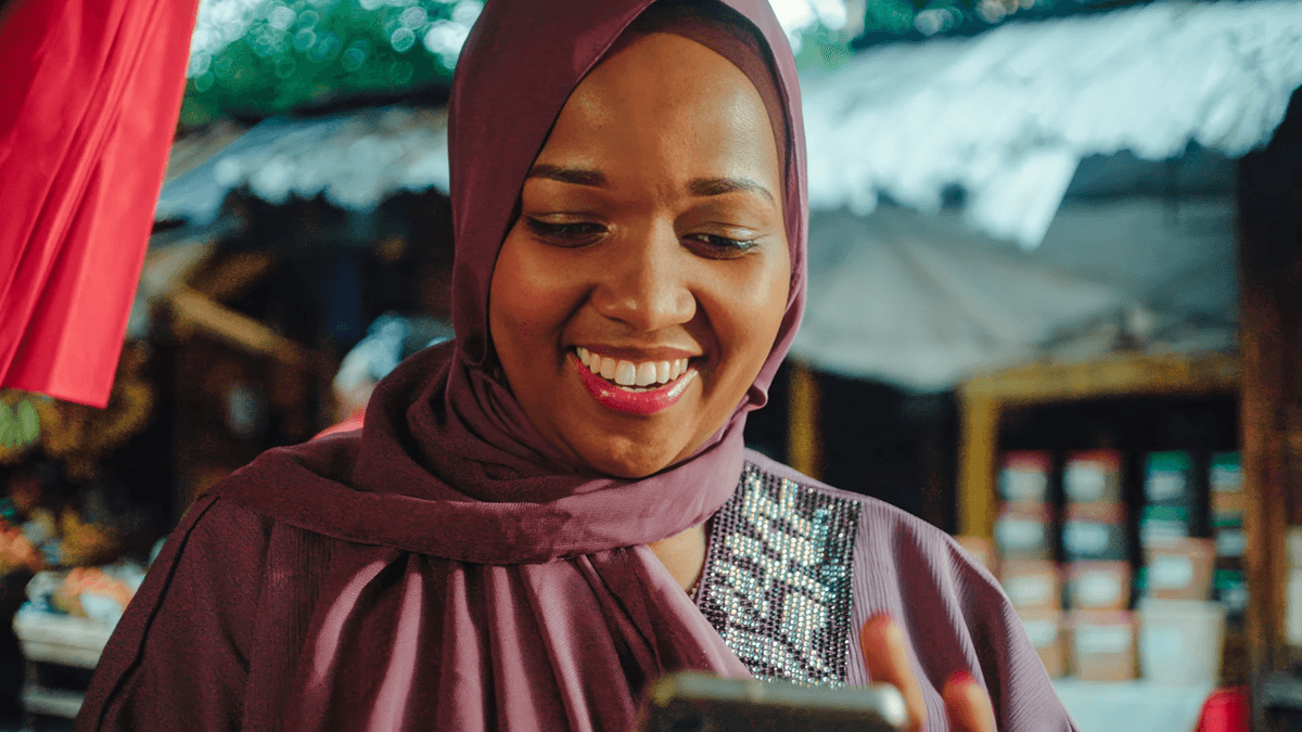 Airtel Africa annual report image showing a mobile user in the Starlink partnership section