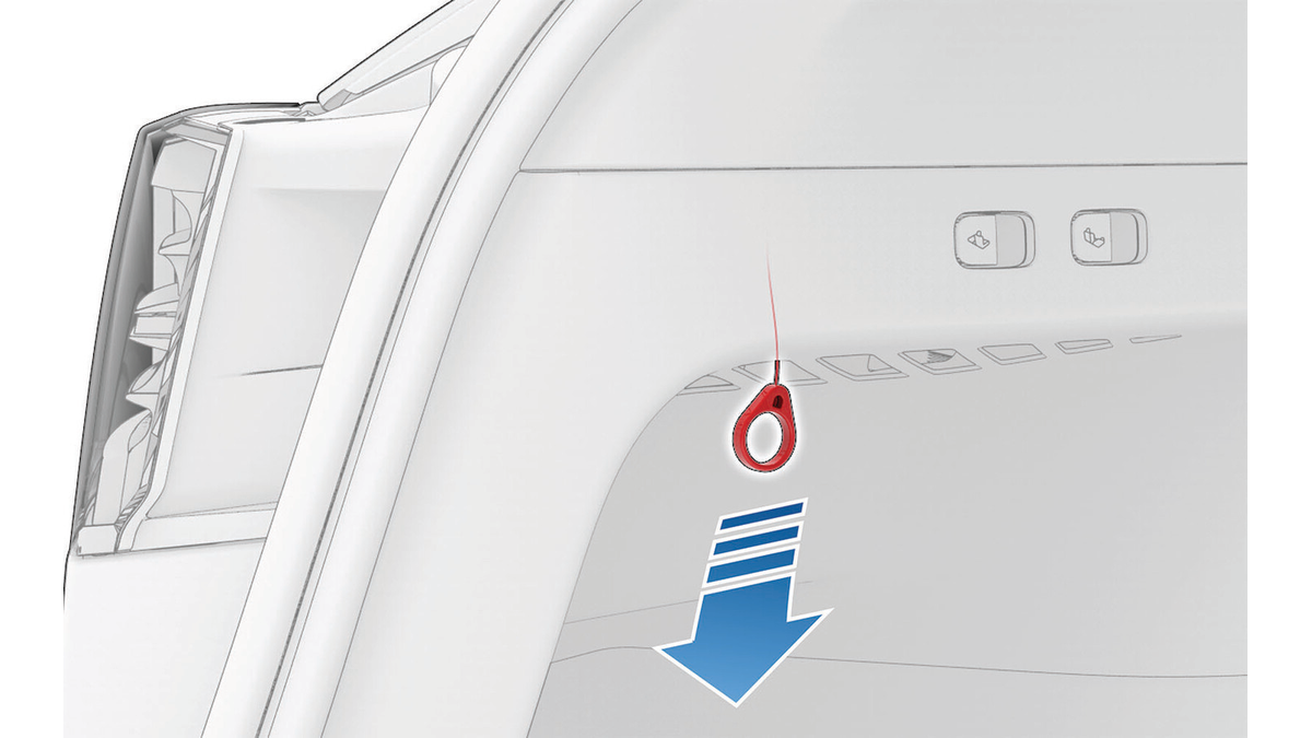 Tesla 2020–2024 Model Y service-manual image showing the charge-port release tag