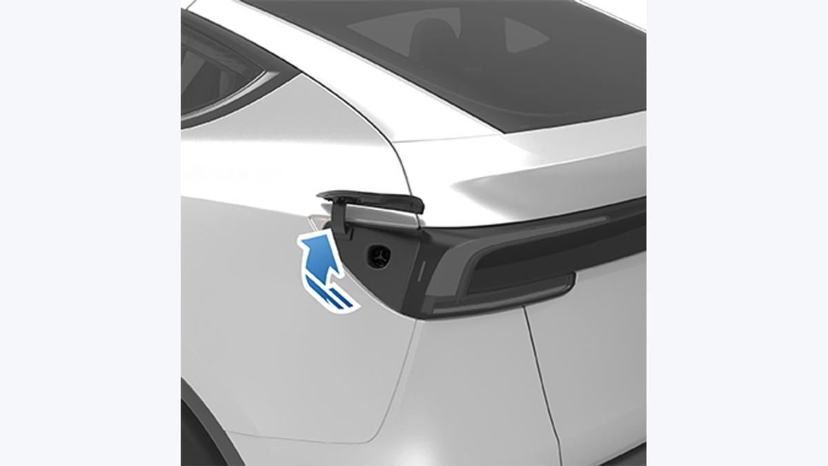Tesla owner-manual illustration of a vehicle charge port for plugged-in cold-weather preconditioning