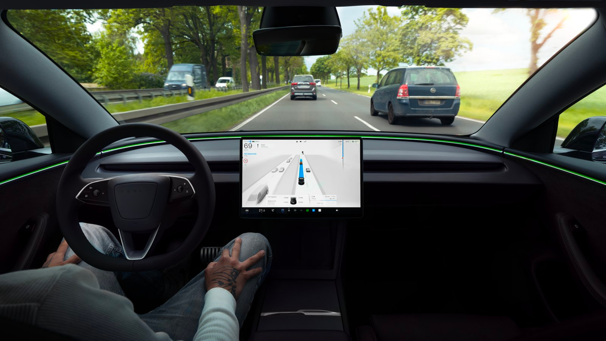 Detail crop of Tesla FSD Supervised operating on a divided road