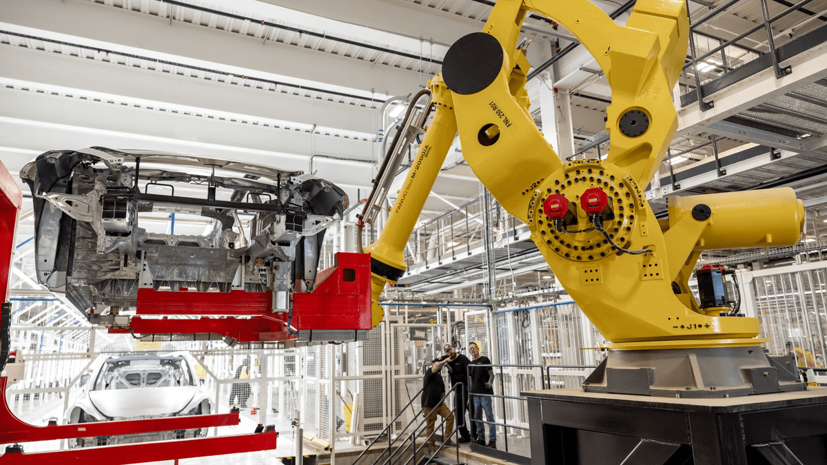 Tesla manufacturing employee working inside Gigafactory Texas