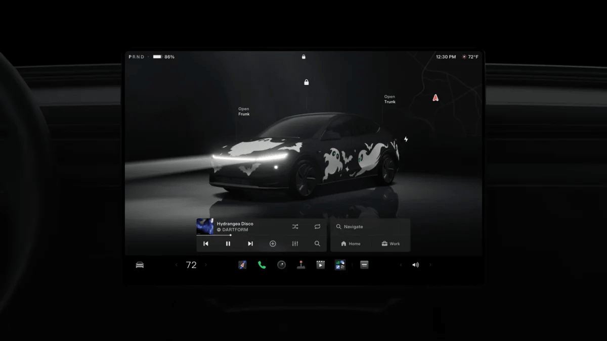 Tesla Halloween-themed vehicle wrap shown on a center display