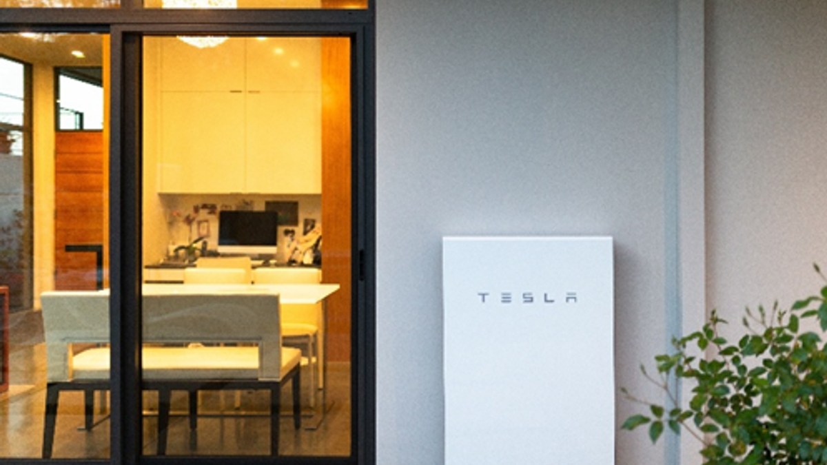 Tesla Powerwall 2 installed beside a home